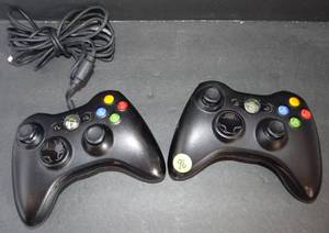 lot 96 image: LOT OF 2 - XBOX 360 GAMING CONTROLLERS