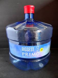 lot 156 image: PLASTEIC REFILLABLE WATER JUG OR NICE BIG COIN BANK
