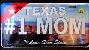 lot 182 image: TEXAS #1 MOM LICENSE PLATE - SEALED