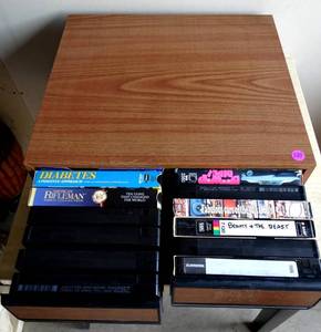 lot 239 image: VHS STORAGE CABINET AND TAPES AS SHOWN