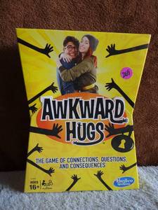 lot 269 image: AWKWARD HUGS GAME - NIB