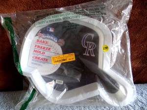 lot 274 image: COLORADO ROCKIE CAKE PAN - CAN BE USED TO DECORATE ANY BASEBALL HAT CAKE (ALSO FREEZABLE)
