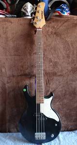 lot 105 image: First Act Double Cut Electric Bass Guitar