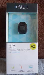 lot 112 image: New Fitbit Zip Wireless Activity Tracker 1 Extra Battery Black - $$$