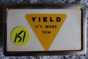 lot 151 image: YIELD ITS MORE FUN BELT BUCKLE