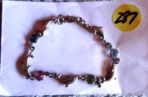 lot 287 image: PRETTY SILVER TONE DOLPHIN & COLORED GEM BRACELET