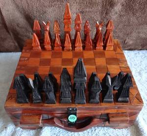 lot 289 image: AUTHENTIC HAND CARVED HAITI CHESSBOARD AND PIECES - SOLID WOOD