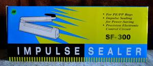 lot 298 image: NEW IN BOX - IMPULSE SEALER SF-300