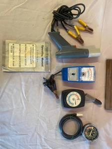 lot 14 image: Tune & Test Kit includes timing light, Dwell Tack Tester, Compression ester, Vacuum and Fuel Pump tester with Manuel
