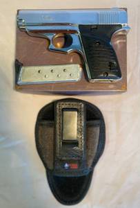 lot 3 image: Lorcin 380 Pistol Model L380L32 Mag with 7 rounds comes in box with side holster