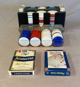 lot 26 image: Vintage Poker chips and 4 decks of cards