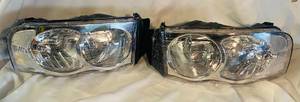 lot 86 image: Chrome Housing Clear Lens Headlights for 2002-2005 Dodge Ram 15002500