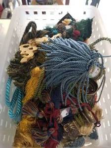 lot 300 image: Bin of curtain pullbacks