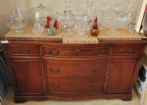 lot 4 image: VINTAGE BUFFET IN STYLE, COLOR, AND CONDITION SHOWN. CONTENTS SEEN NOT INCLUDED. Approx. 58 x 18 x 33.25.