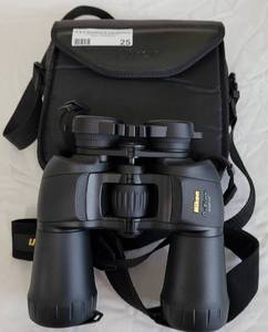 lot 25 image: NIKON ACTION 12X50 5.5 BINOCULARS WITH STORAGECARRYING CASE AS SHOWN. CHECK IT OUT