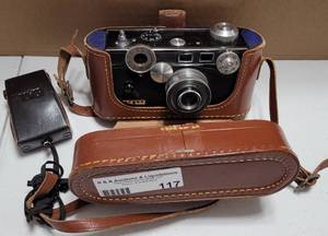 lot 117 image: VINTAGE 1950S ARGUS RANGEFINDER FILM CAMERA WITH CINTAR 50MM COATED LENS, LEATHER CASE AND STRAP PLUS ACCESSORY AS SHOWN. TAKE A LOOK