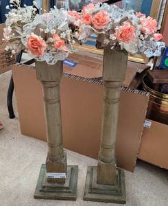 lot 136 image: LOT OF 2 TALL CANDLE HOLDERS WITH FLORAL DECOR AS SHOWN.