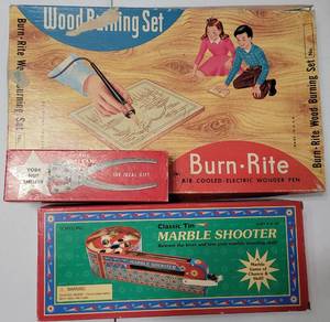 lot 182 image: VINTAGE ITEMS INCLUDING WOOD BURNING SET, CLASSIC TIN MARBLE SHOOTER, AND THE TEXAN NUT SHELLER AS SHOWN.