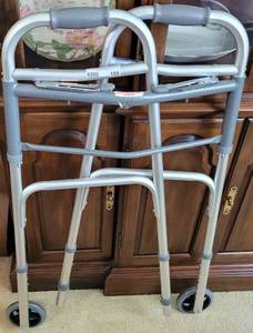 lot 188 image: FOLDING WALKER AS SHOWN.