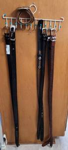 lot 217 image: BELTS WITH HANGER AS SHOWN.