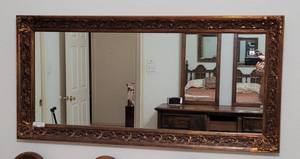 lot 222 image: LARGE RECTANGULAR MIRROR IN STYLE, COLOR, AND CONDITION SHOWN. Approx. 54 x 28.