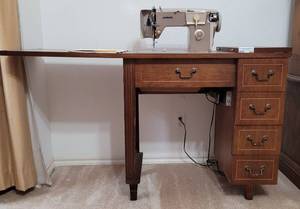 lot 224 image: VINTAGE NELCO SEWING MACHINE MODEL JA-38 WITH CONTENTS OF DRAWERS AND MANUAL AS SHOWN.