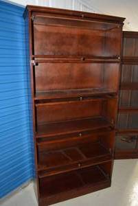 lot 45 image: Cherry Finish Bookcase with Glass Doors as shown  36x12x76