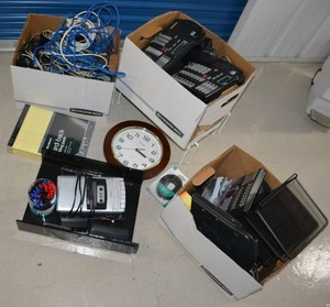 lot 65 image: Misc. Office Supplies Tape Recorder, Unopened Writing Pads, Clock, Avaya and Nortel Phones and More