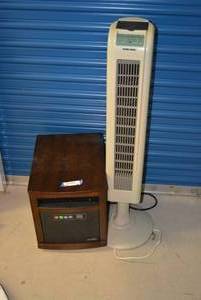 lot 36 image: Duraflame Movable Heater with Remote, and Black & Decker Tower Fan