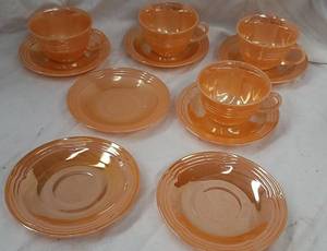 lot 39 image: Fire King Peach Lusterware Teacups and Saucers