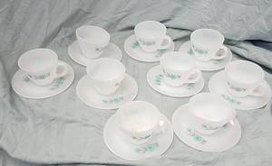 lot 40 image: Fire King Milk-Glass Teacups and Saucers