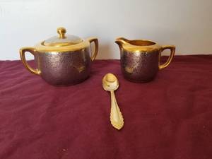 lot 62 image: Creamer and Sugar set