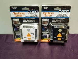 lot 102 image: LYNX 12-LED LIGHT WITH MOTION AND DAWNDUSK SENSORS  WHITE and Black