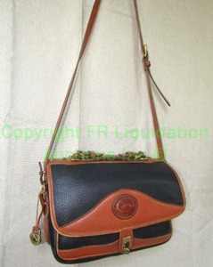 lot 33 image: Genuine Dooney & Bourke leather hand crafted purse, made in USA