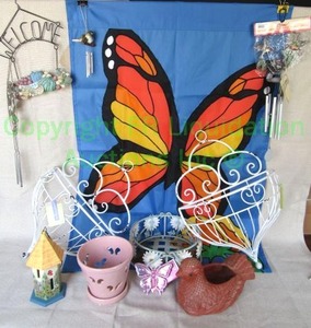 lot 48 image: Assorted garden decor as shown