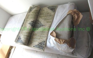 lot 187 image: Large carpets in plastic wrap and entry carpet