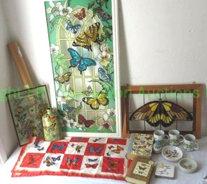 lot 198 image: Butterfly motif items and collectibles including stained glass art