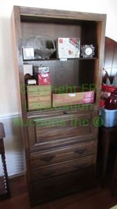 lot 209 image: A. Brandt company oak wood storage cabinet (Contents not included)