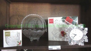 lot 210 image: Mikasa crystal clock, basket, and serving dishes