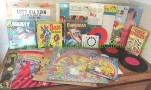 lot 231 image: Vintage childrens LP records and books including Bozo the clown, Frosty the snowman and more