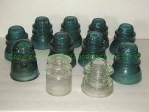 lot 104 image: Antique Hemingray glass insulators