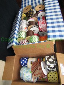 lot 69 image: Assorted rolls of ribbon as shown