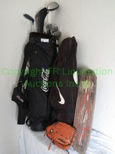 lot 297 image: Coca Cola golf bag, golf clubs, Wilson baseball mits and more as shown