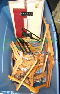lot 125 image: Wood hangers and Sahara collection portable closet
