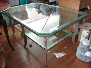 lot 175 image: Glass top metal base coffee table