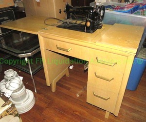 lot 182 image: Vintage early century Singer sewing machine and table plus contents in drawers