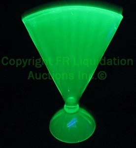 lot 3 image: Mid century uranium oxide depression glass fan vase