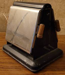 lot 15 image: Vintage 2 Drop Down Doors Toaster With Stainless Steel Finish as shown.
