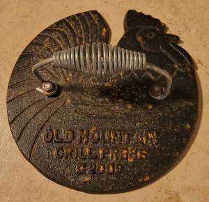 lot 18 image: 2009 Old Mountain Cast Iron Rooster Grill Press as shown.