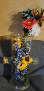 lot 24 image: Tall Cylinder Glass Vase With Flowers as shown.